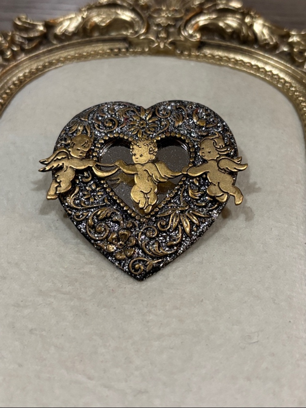 Vintage Ornate heart-shaped brooch decorative metal frame with cherubs